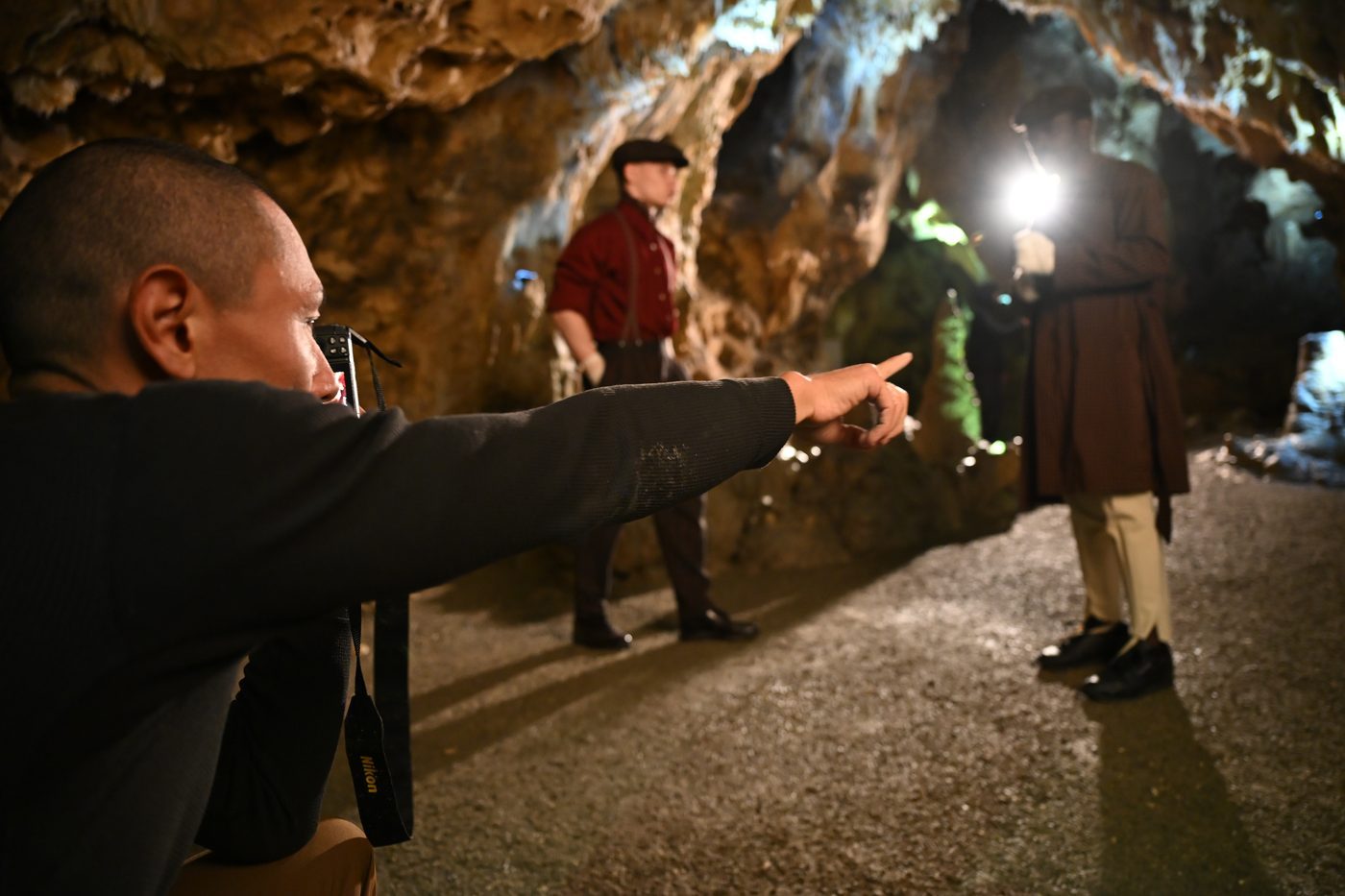 Ray Demski directing the two boxers inside the cave